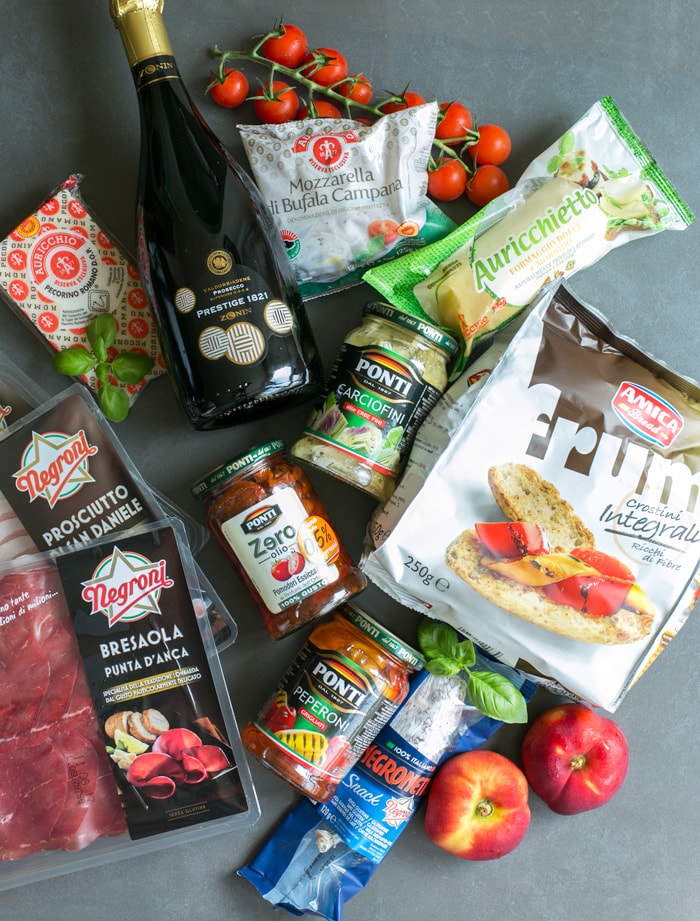 Italian Aperitivo Platter - Planning an al fresco event to entertain your guests this summer? Look no further - It really doesn’t get easier (and tastier) than Italian aperitivo, with tasty cheeses, charcuterie, vegetables and fruit. Recipe by The Petite Cook