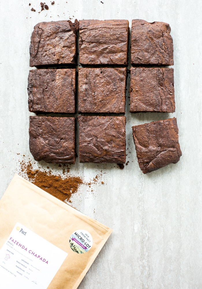 espresso brownies cut into squares , pact coffee pack on the left down side of the picture