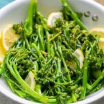sauteed baby broccoli. Image with text for Pinterest.