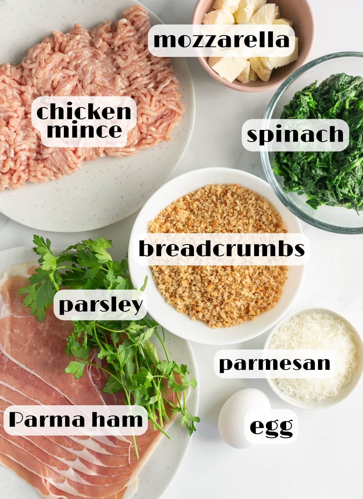 chicken meatloaf ingredients: ground chicken, breadcrumbs, parsley, egg, parmesan cheese, parma ham, spinach, mozzarella.