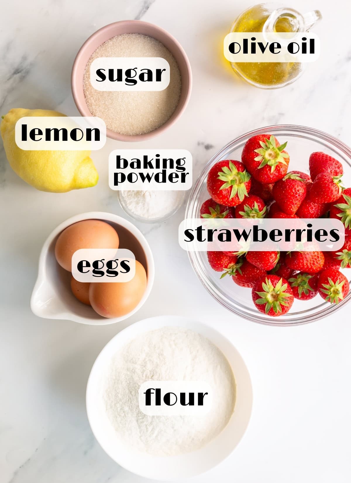 italian strawberry cake ingredients: strawberries, olive oil, sugar, flour, lemon, eggs, baking powder.