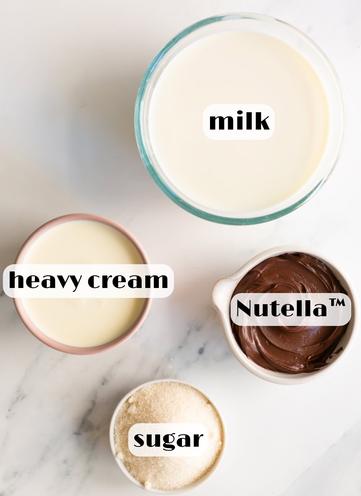 Nutella gelato ingredients: milk, Nutella, heavy cream and sugar.