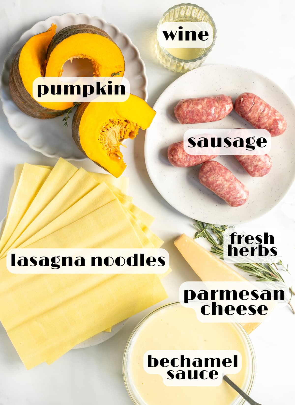 sausage pumpkin lasagna ingredients: sausage, pumpkin, lasagna noodles, parmesan, wine, herbs and béchamel sauce.