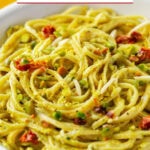 Pistachio pesto with pasta. Image with text for Pinterest.